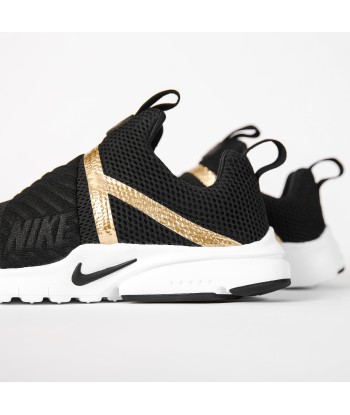 Nike GS Presto Extreme - Black / Metallic Gold / White s'inspire de l'anatomie humaine